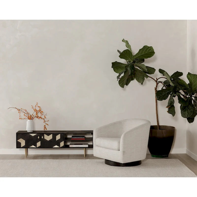 Fauteuil pivotant crapaud moderne et rembourré