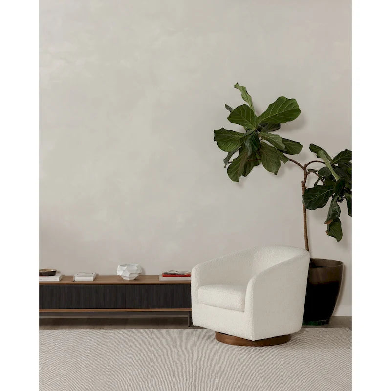 Fauteuil pivotant crapaud moderne et rembourré