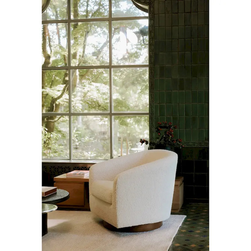 Fauteuil pivotant crapaud moderne et rembourré